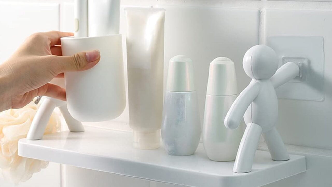 Charming Self Adhesive Floating Wall Shelf with Human Figurine Design